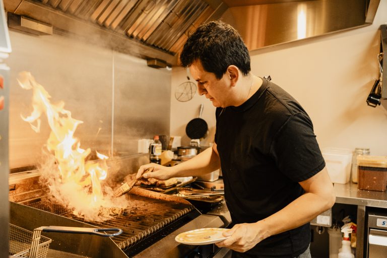 Cooking at stove